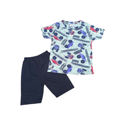 Children's outfit with a patterned shirt and navy shorts on a white background