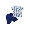 Children's outfit with a patterned shirt and navy shorts on a white background
