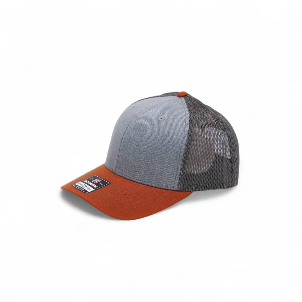 Gray and orange baseball cap on a white background
