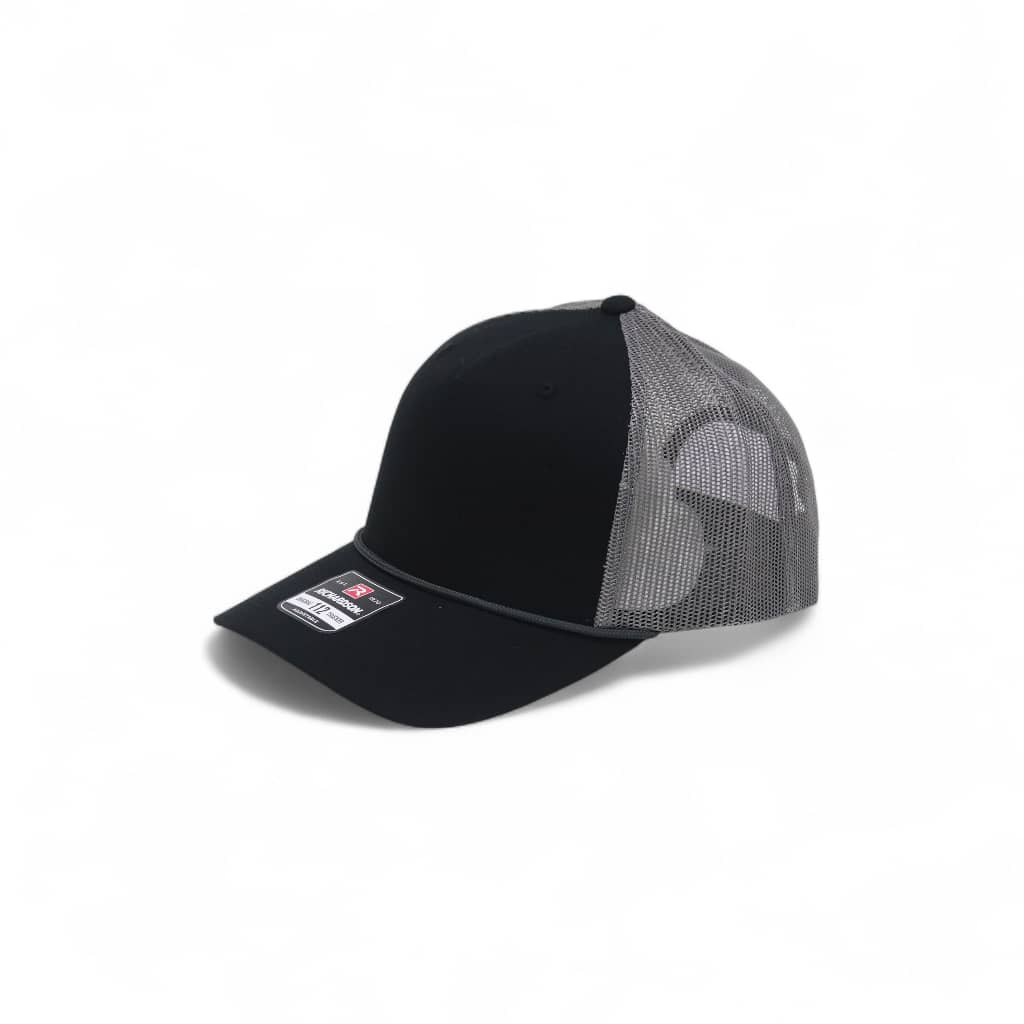 Black and gray cap with mesh back on a white background